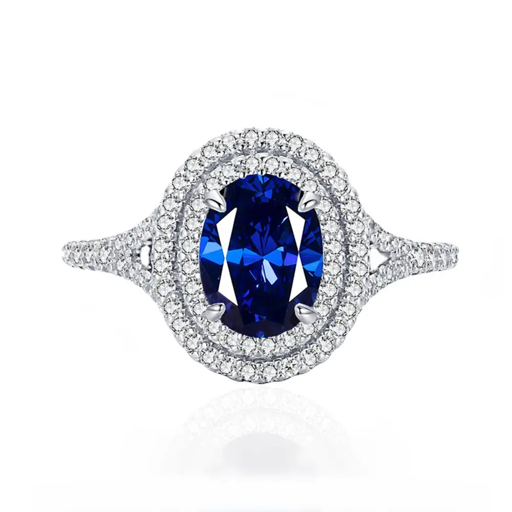 Jewelry-925Oval-blue_Cushion-Prongsetting-frontview_928c78f7-6376-47b9-aa9b-3bf6b482f7cc.jpg