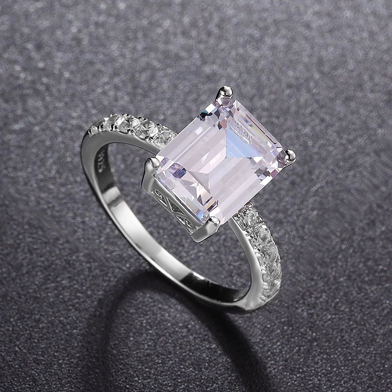 Jewelry_4ct-925Silver-Emerald-Prong-Moissanite-SideView.jpg