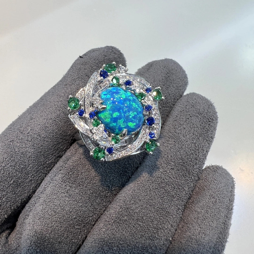 Jewelry_925Silver-Blue-Oval-prong-Opal-sideview.jpg