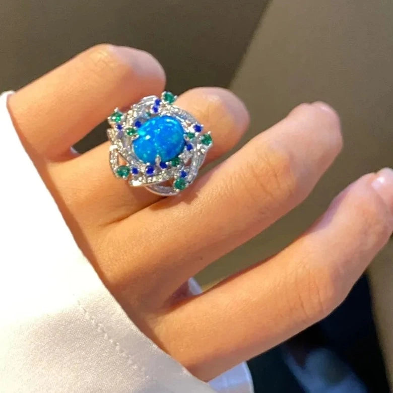 Jewelry_925Silver-Blue-Oval-prong-Opal-topview.jpg