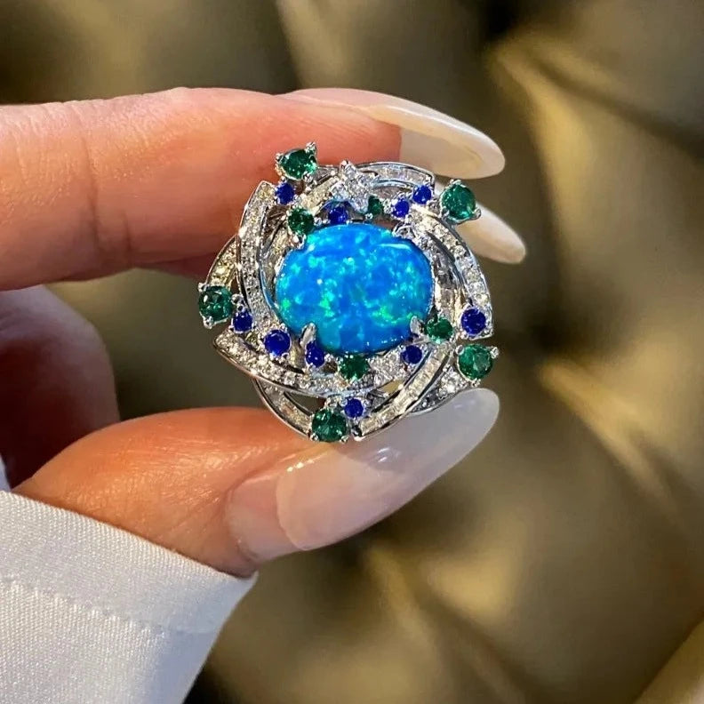 Jewelry_925Silver-Blue-Oval-prong-Opal.jpg