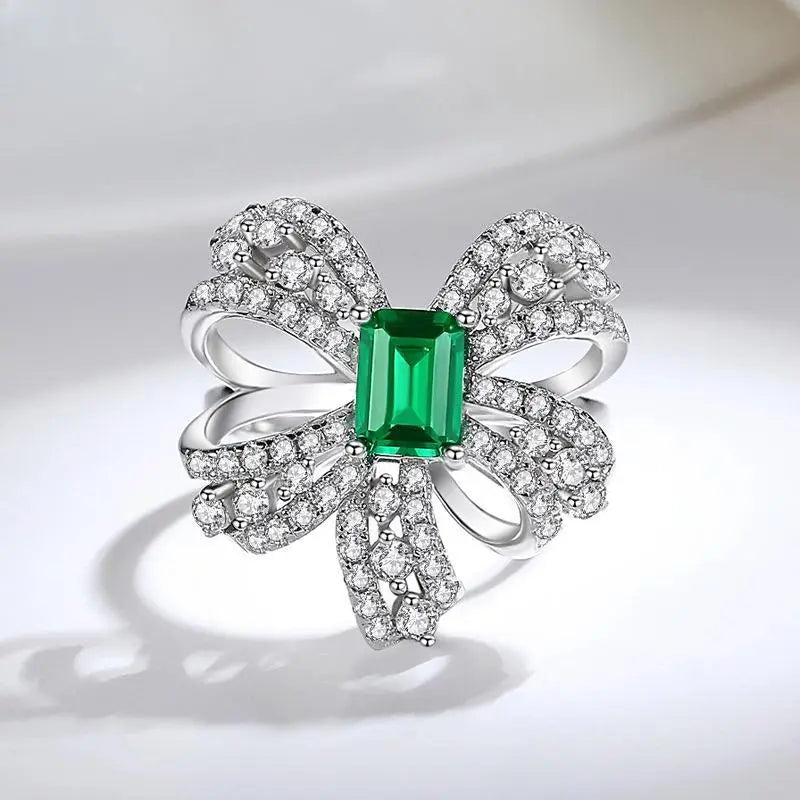 Jewelry_925Silver-Emerald-Prongsetting-FrontView_2adc8825-3bf9-48db-9112-bbcbd19f8190.jpg