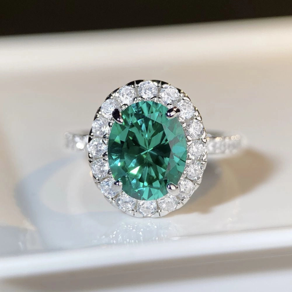 Jewelry_925Silver-Green-Oval-ProngSetting-HighCarbonDiamond-FrontView_76beebc6-9a5d-4986-b9bc-d59050a8d930.jpg