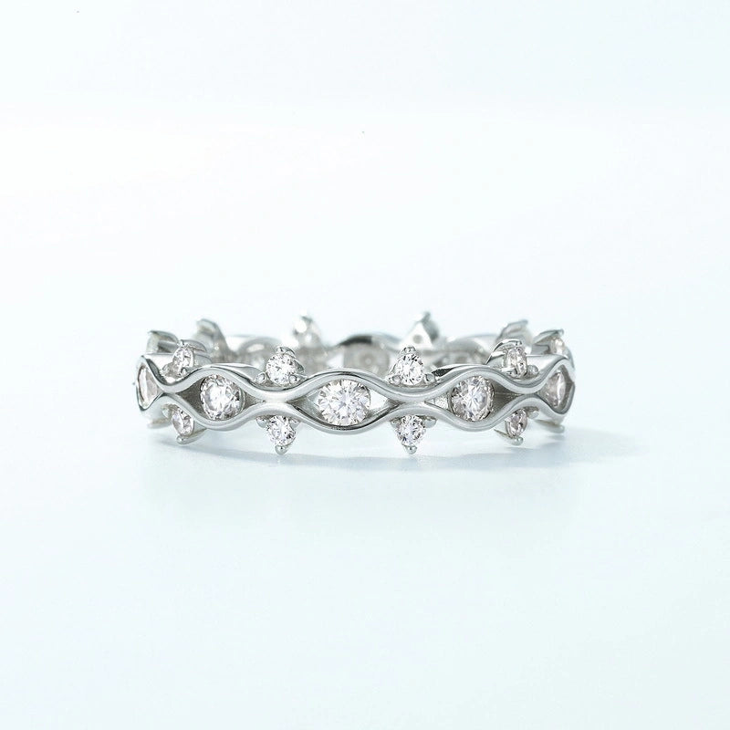 Wave-shaped diamond eternity band