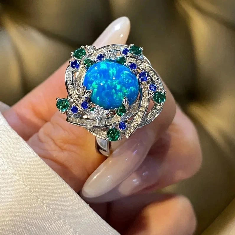 Jewelry_925Silver_Blue-Oval-prong-Opal-sideview.jpg
