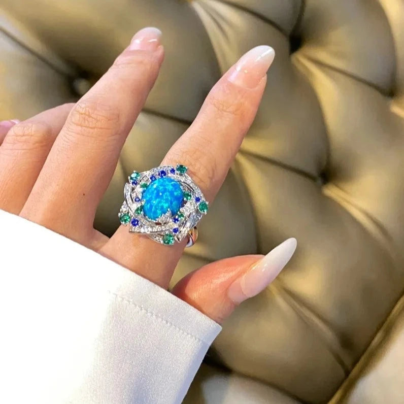 Jewelry_925Silver_Blue-Oval-prong-Opal.jpg