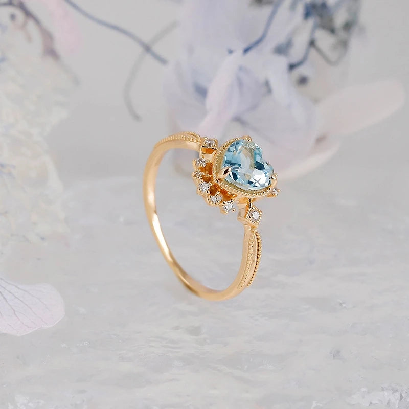 Heart - shaped gem halo ring