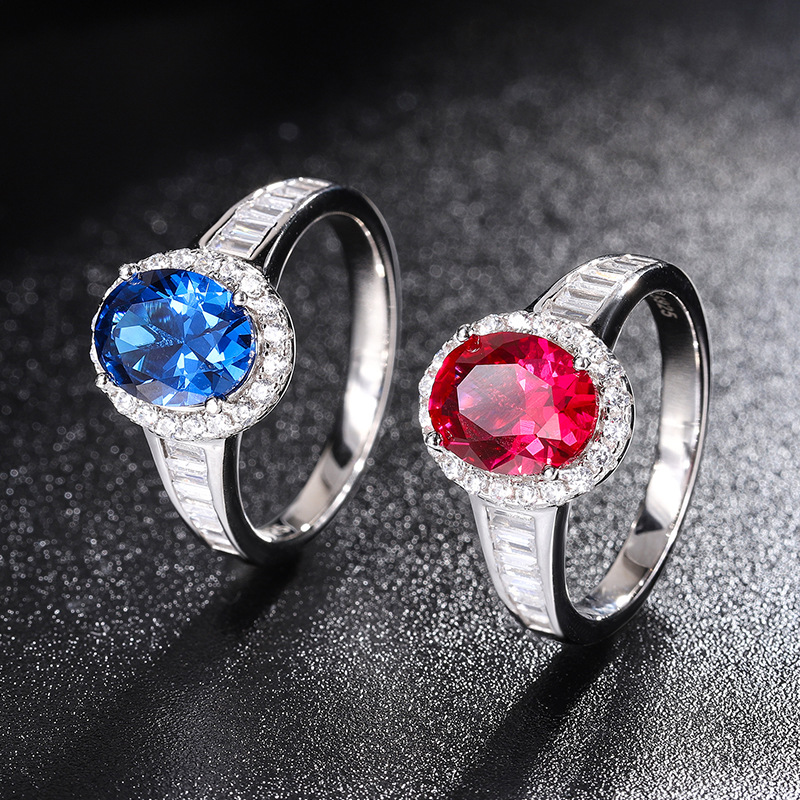 Oval gem halo baguette ring