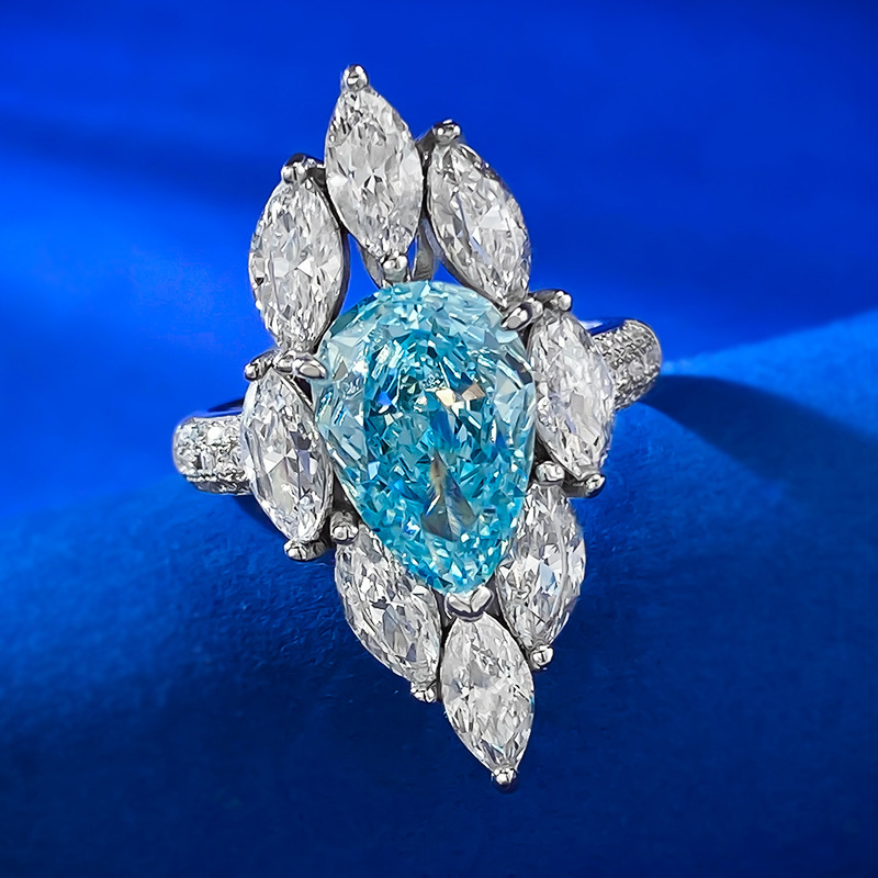 Pear gem starburst ring