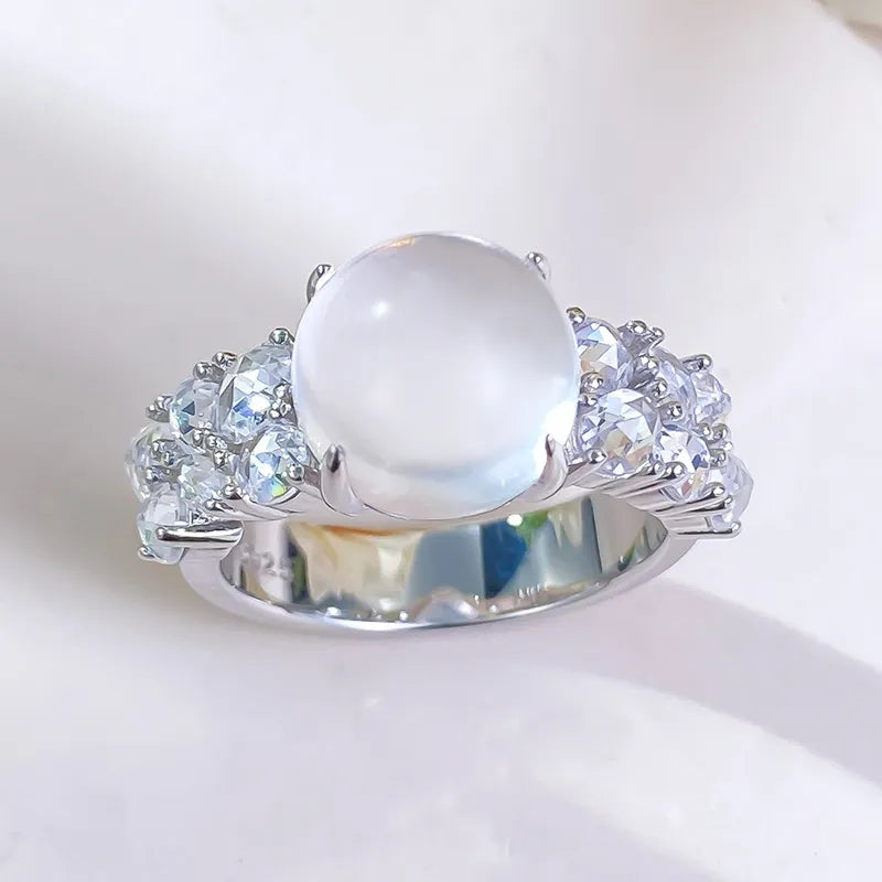 Round gemstone accent ring