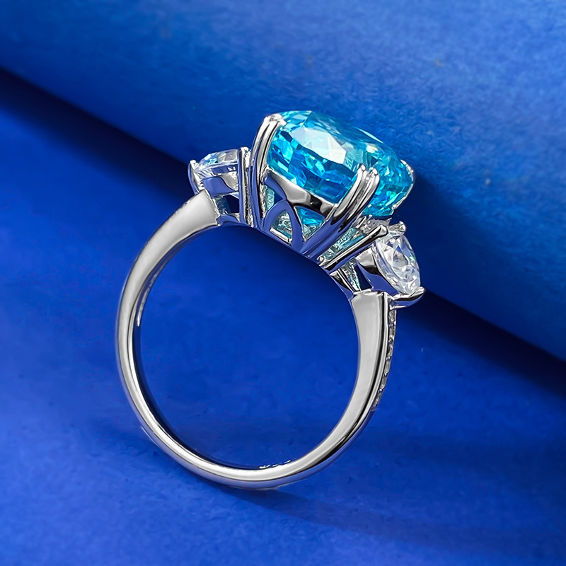 Oval gem with pear accents ring