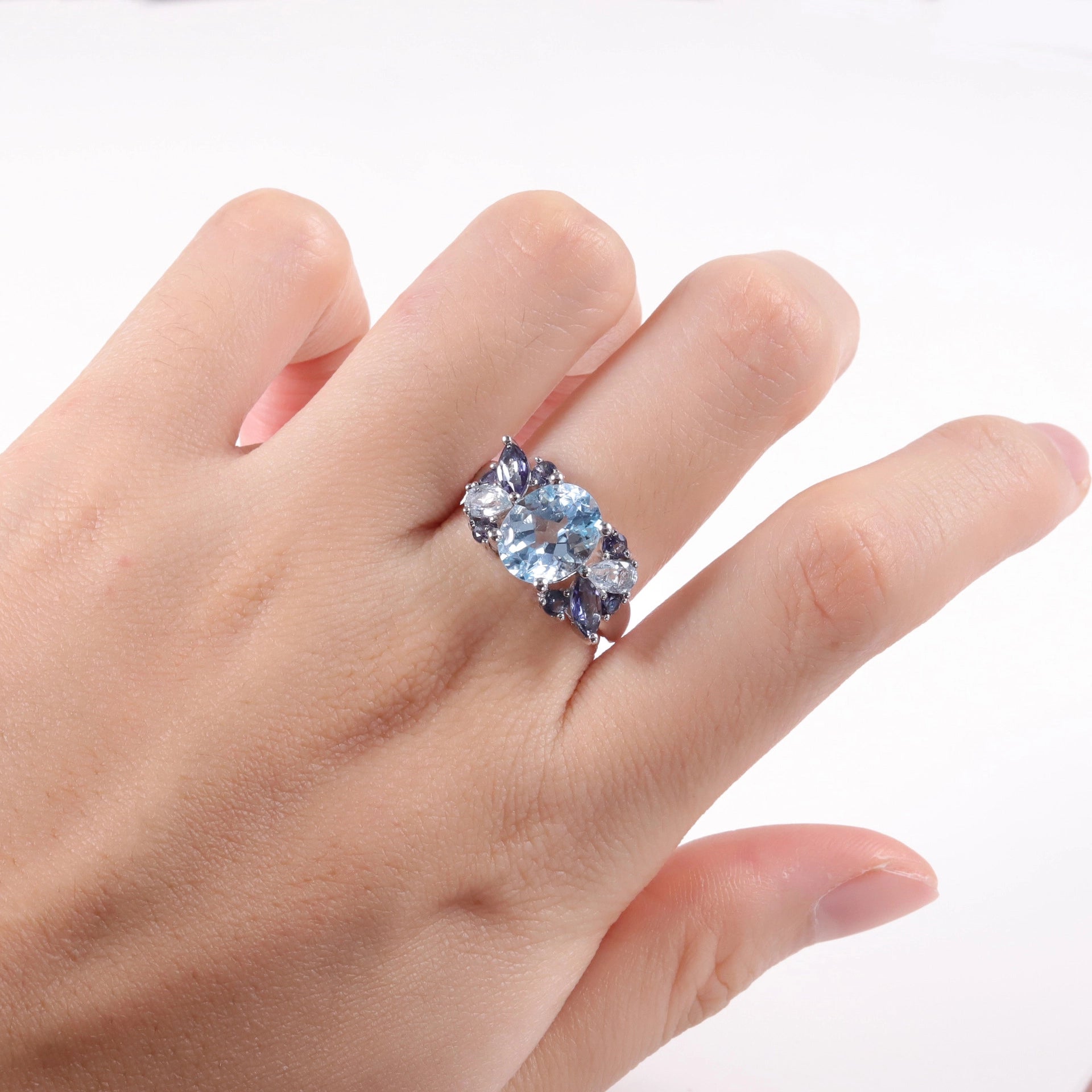 jewelry-925silver-Blue-Oval-prong-Topaz-IceFlowerCut-topview.jpg