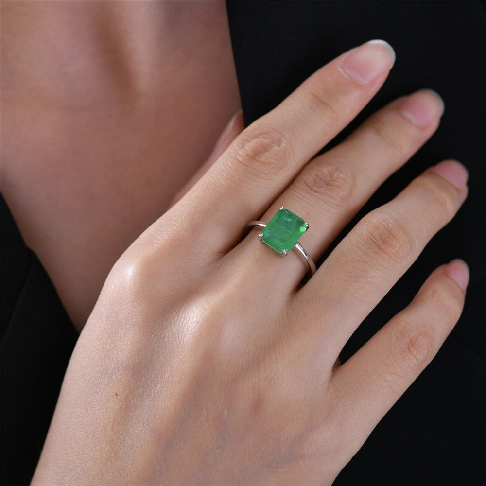Emerald - cut solitaire ring