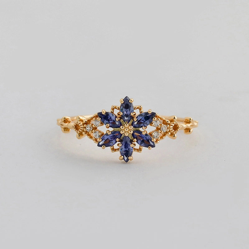 jewelry_925gold-blue-prong-HighCarbonDiamond-IceFlowerCut-frontview.jpg