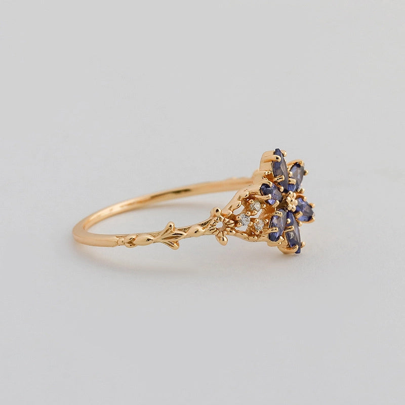 jewelry_925gold-blue-prong-HighCarbonDiamond-IceFlowerCut-sideview.jpg