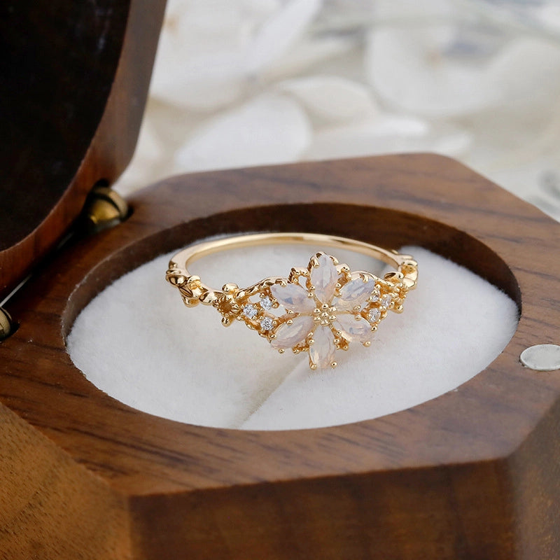 jewelry_925gold-opal-prong-HighCarbonDiamond-IceFlowerCut-sideview.jpg
