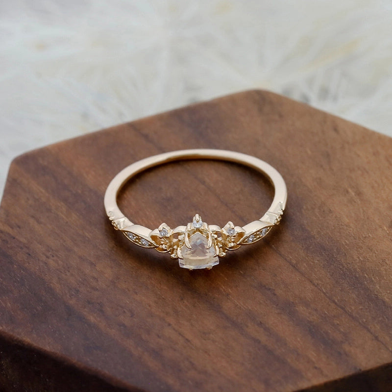 jewelry_925gold_moonstone-prong-IceFlowerCut-frontview.jpg