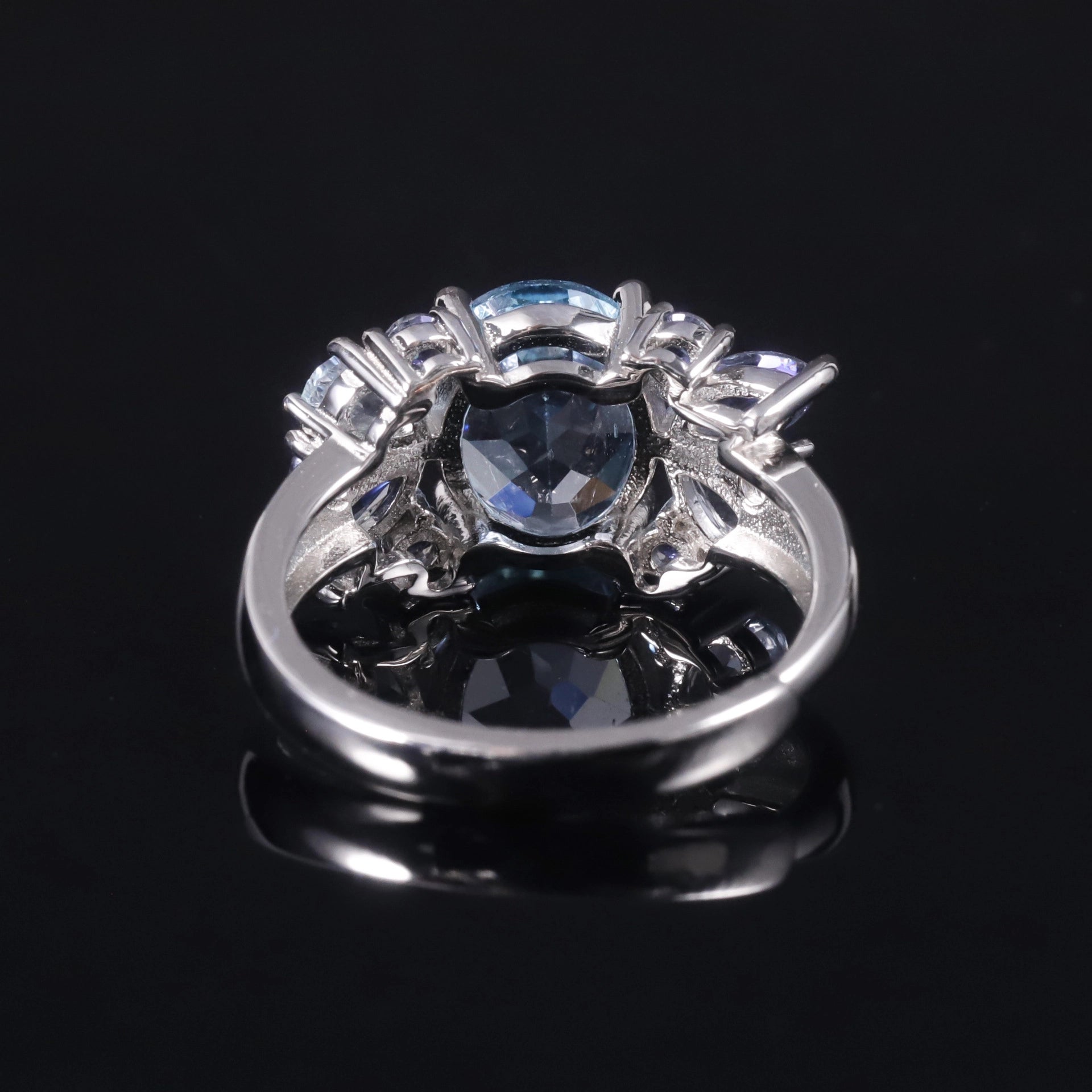 jewelry_925silver-Blue-Oval-prong-Topaz-IceFlowerCut-rear.jpg