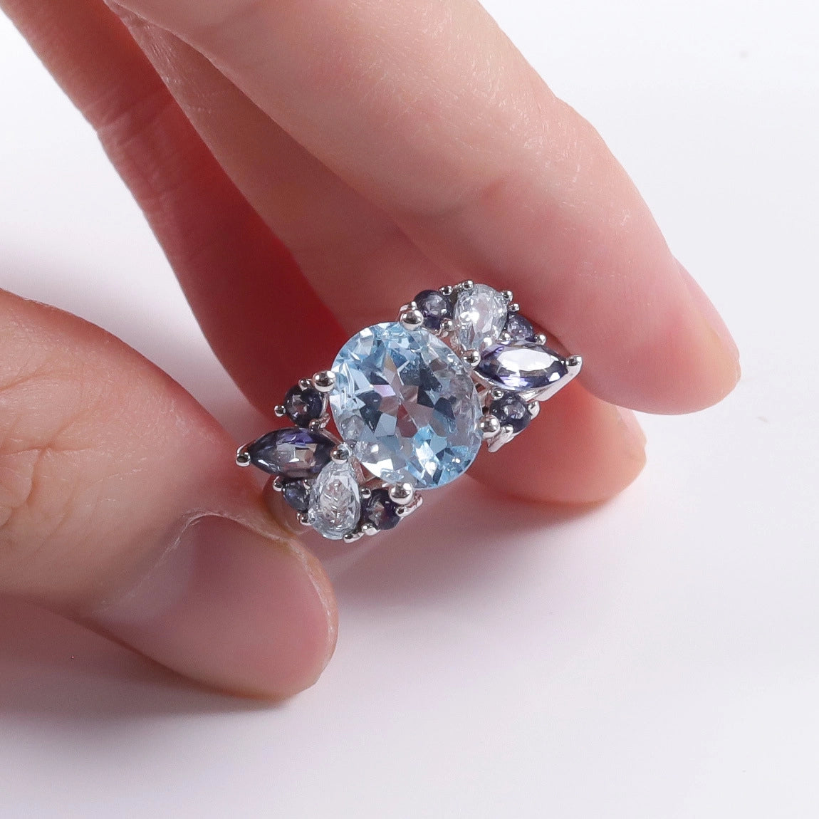 jewelry_925silver-Blue-Oval-prong-Topaz-IceFlowerCut-topview.jpg