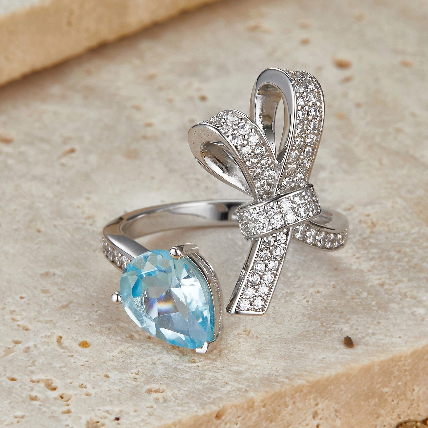 jewelry_925silver-Blue-Pear-prong-HighCarbonDiamond-frontview_d50457cb-3702-4c3f-b5af-1888765ee6f4.jpg