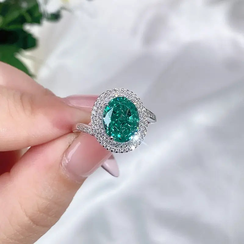 jewelry_925silver-Oval-green-prong-Paraiba-IceFlowerCut-TopView_882287c6-3040-4f66-b9c2-727550f4fa25.jpg