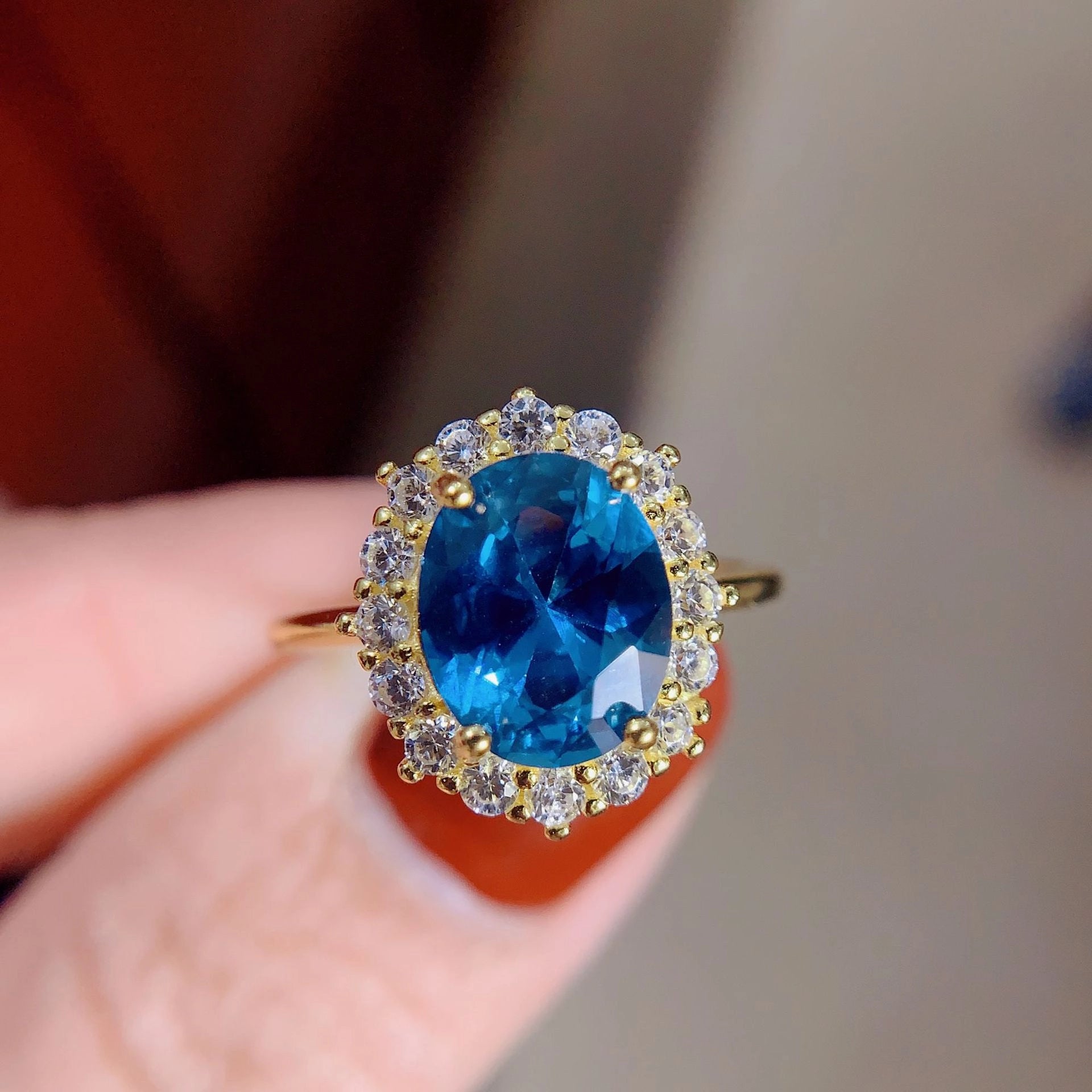 jewelry_925silver-blue-Oval-prong-Topaz-SapphireCut-frontview.jpg
