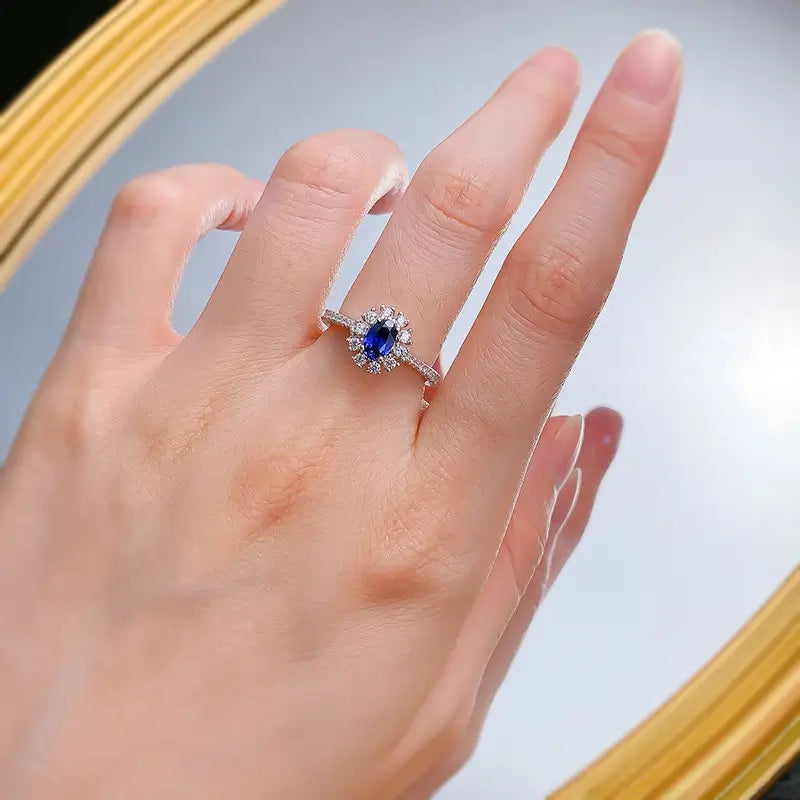 jewelry_925silver-blue-oval_prong_highcarbondiamond_iceflowercut_topview.jpg
