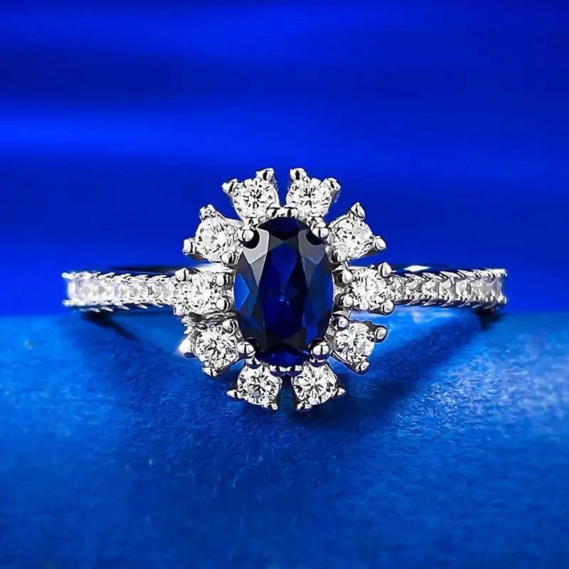 jewelry_925silver-blue_oval_prong_highcarbondiamond_iceflowercut_frontview.jpg