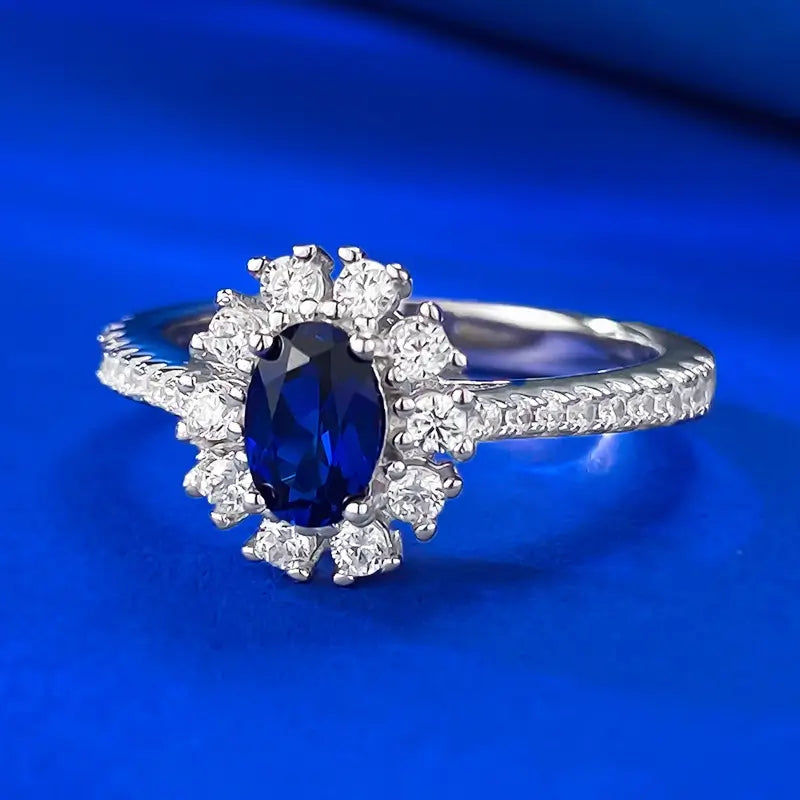 jewelry_925silver-blue_oval_prong_highcarbondiamond_iceflowercut_sideview.jpg