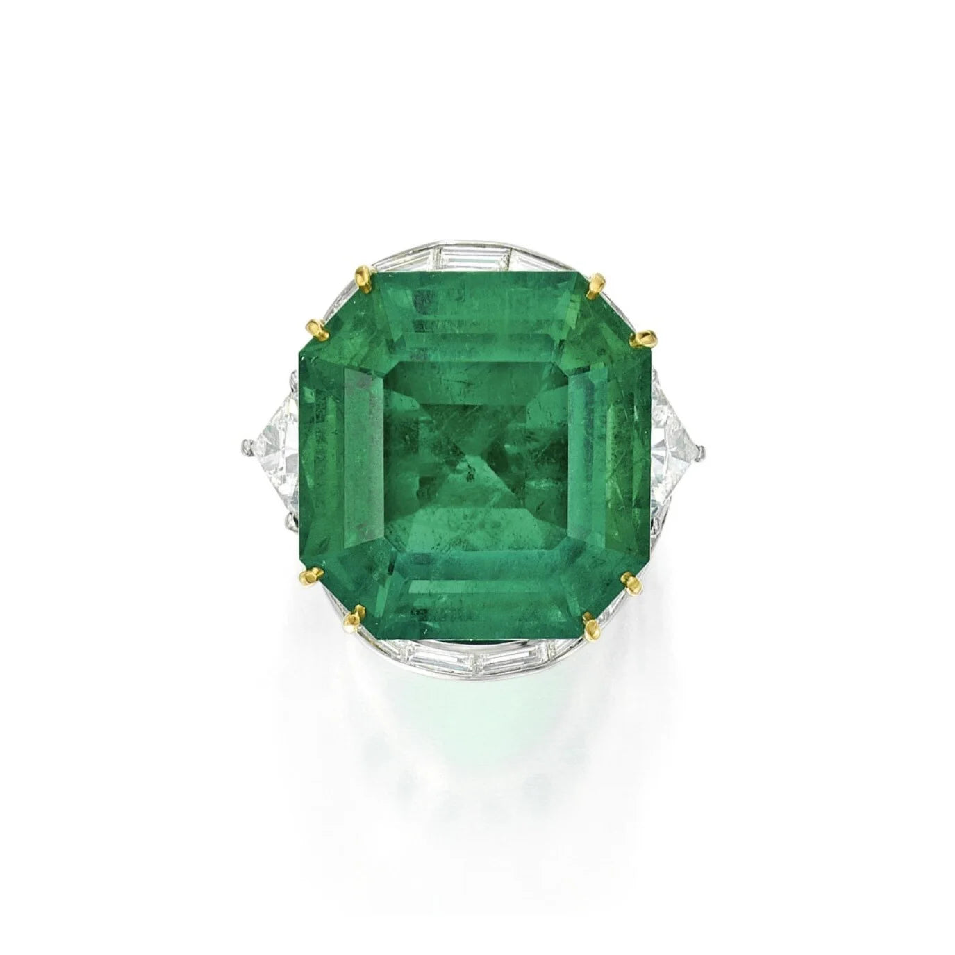 Emerald halo statement ring