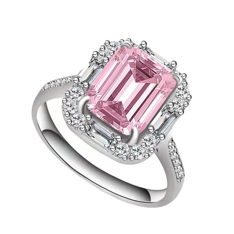 Emerald - cut halo baguette ring