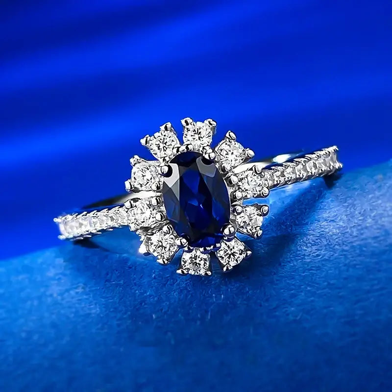 jewelry_925silver_blue-oval_prong_highcarbondiamond_iceflowercut_frontview.jpg