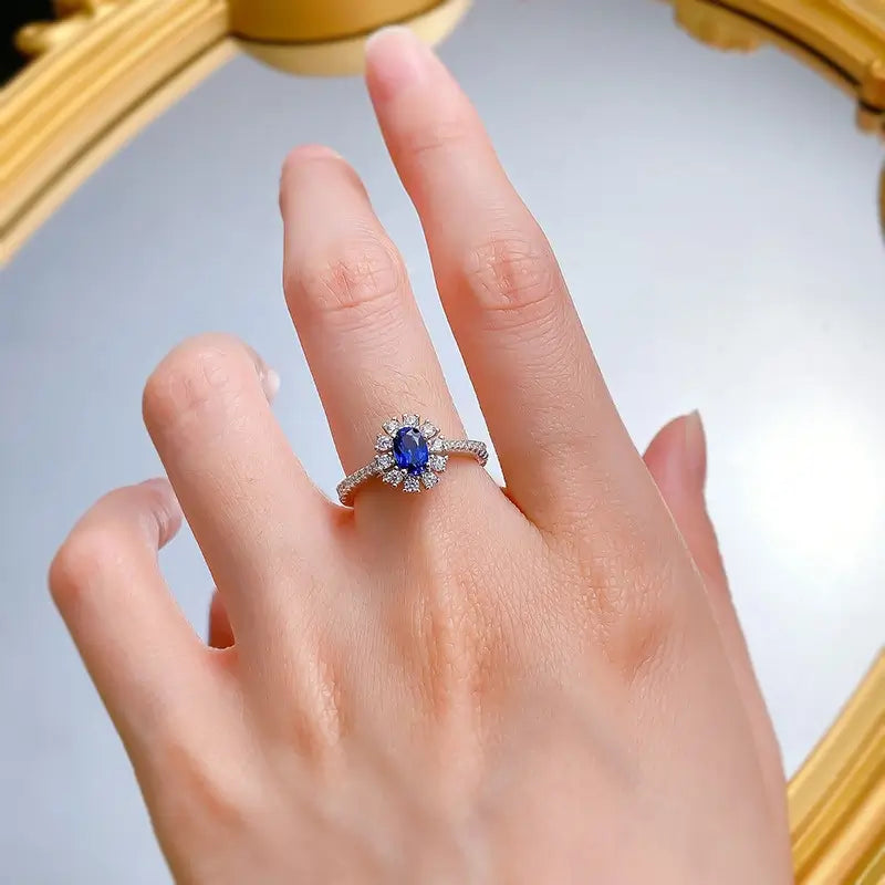 jewelry_925silver_blue_oval-prong_highcarbondiamond_iceflowercut_sideview.jpg
