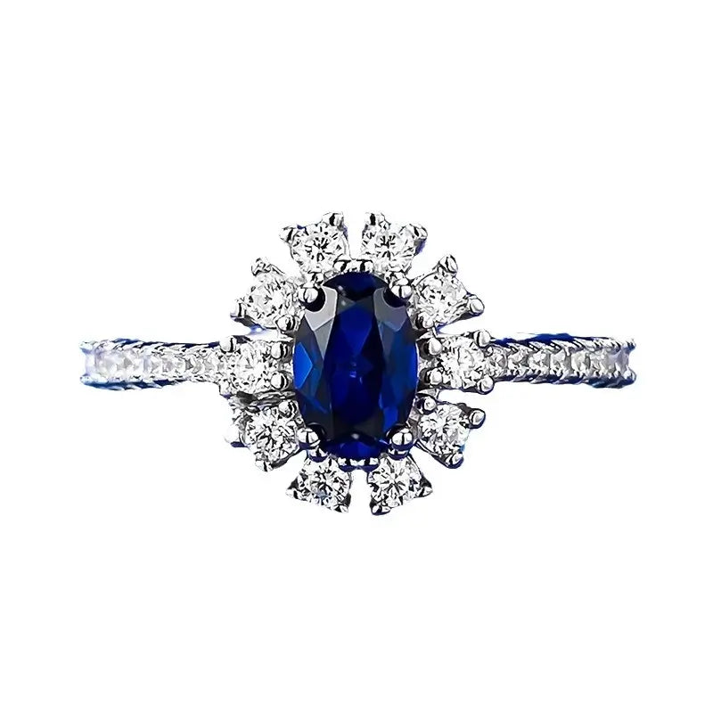 jewelry_925silver_blue_oval_prong_highcarbondiamond_iceflowercut_frontview.jpg